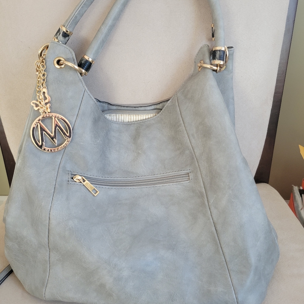 Mia Farrow purse.